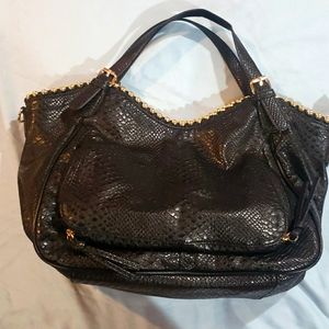 Big Buddha Black handbag. 16×10 Black with gold studded details. Faux leather